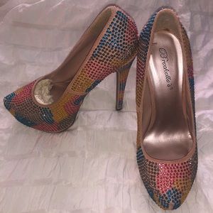 Breckelle’s Rhinestone platform pumps